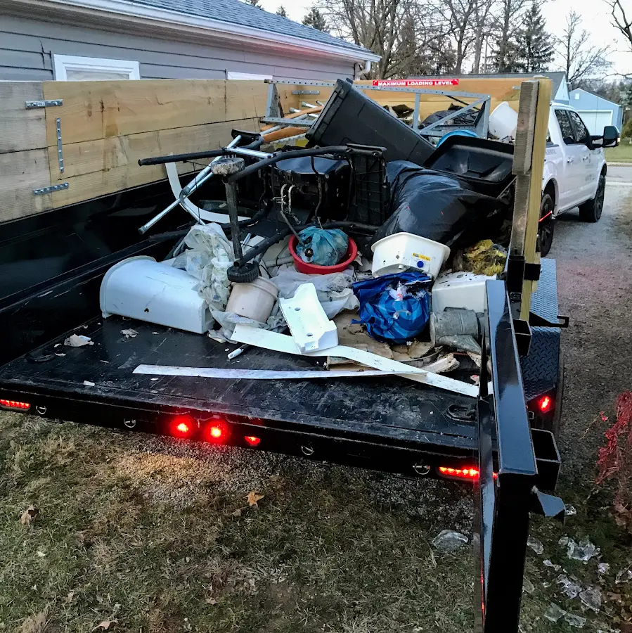 Roll-off dumpster delivered to a residential driveway in Wildwood Lake