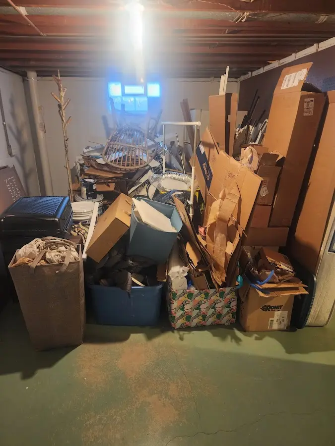 Roll-off dumpster container at job site for Cleanout Dumpster Rental in Wildwood Lake